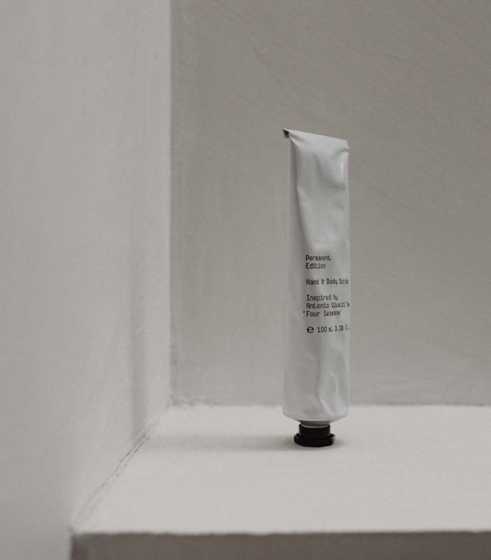 kaboompics_ugc-style-image-of-a-hand-and-body-scrub-tube-on-a-neutral-background-free-stock-photo-34705